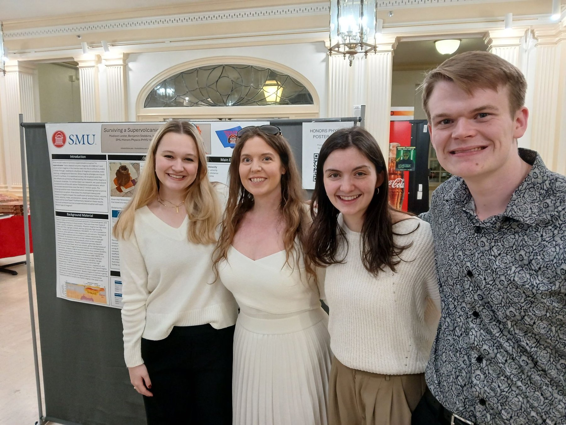 Rebecca Preston with honors physics students at their end-of-term poster session at SMU
